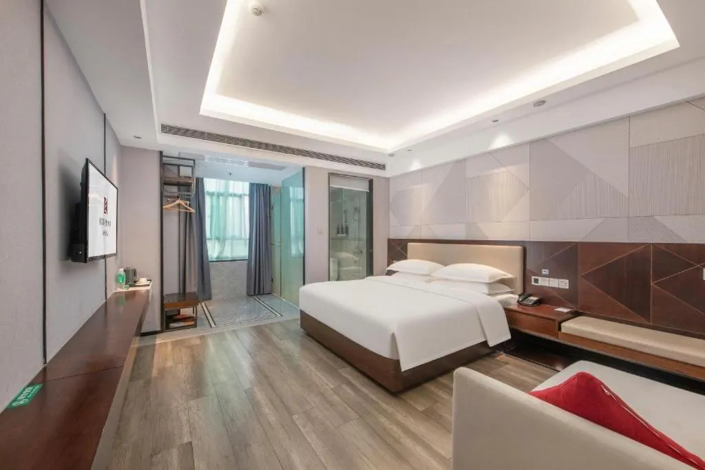 Bed in Borrman Hotel Yunfu Xinxing County Bus Station