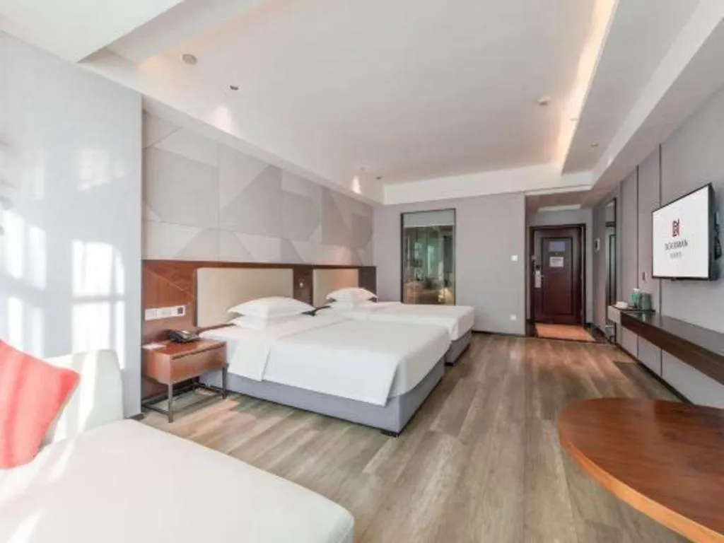 Bed in Borrman Hotel Yunfu Xinxing County Bus Station