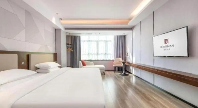 Bed in Borrman Hotel Yunfu Xinxing County Bus Station