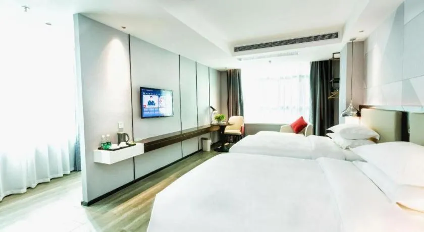 Bed in Borrman Hotel Yunfu Xinxing County Bus Station