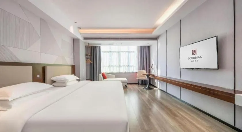 Bed in Borrman Hotel Yunfu Xinxing County Bus Station