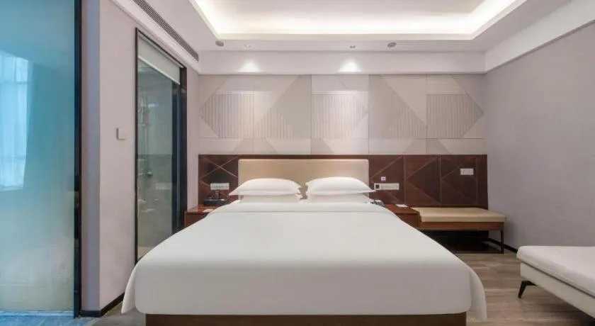 Bed in Borrman Hotel Yunfu Xinxing County Bus Station