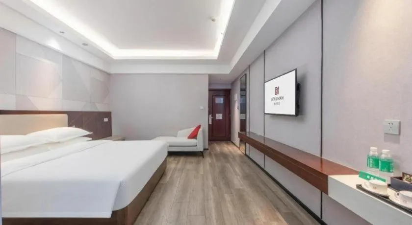 Bed in Borrman Hotel Yunfu Xinxing County Bus Station