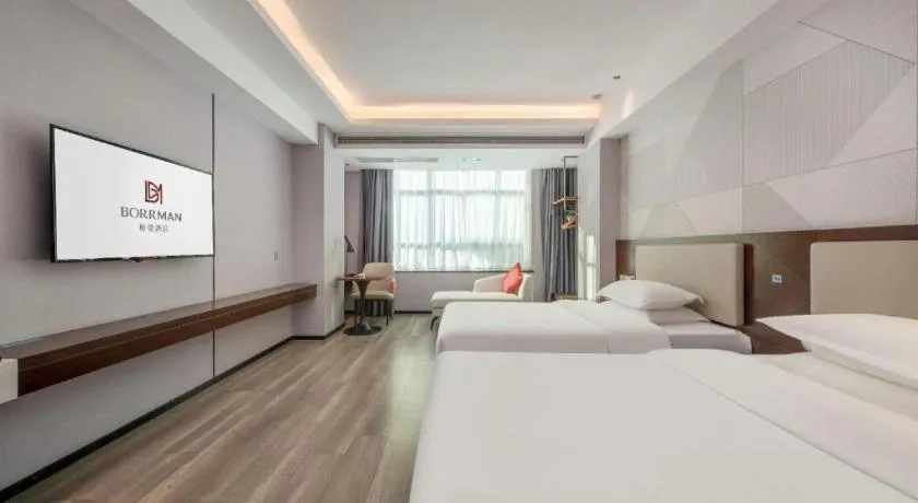 Bed in Borrman Hotel Yunfu Xinxing County Bus Station