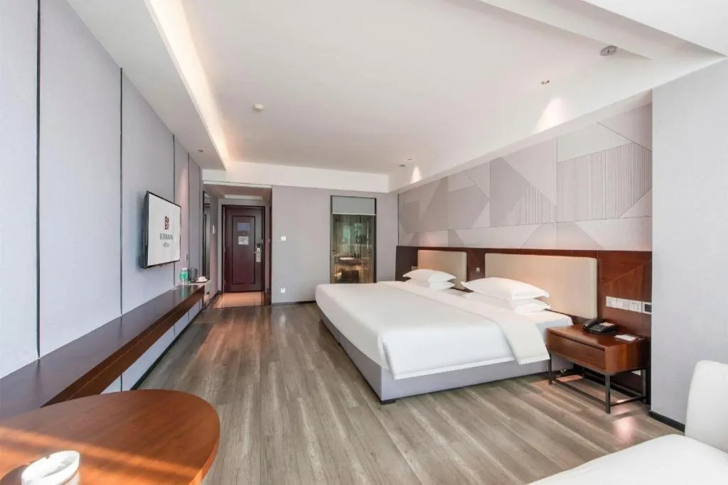 Bed in Borrman Hotel Yunfu Xinxing County Bus Station