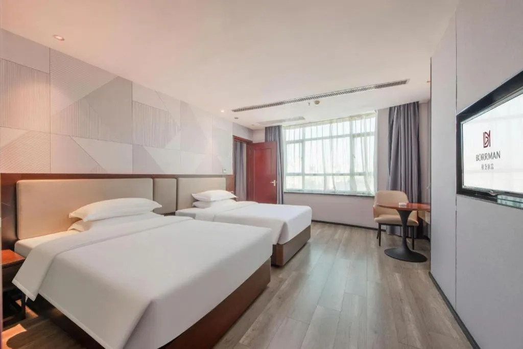 Bed in Borrman Hotel Yunfu Xinxing County Bus Station