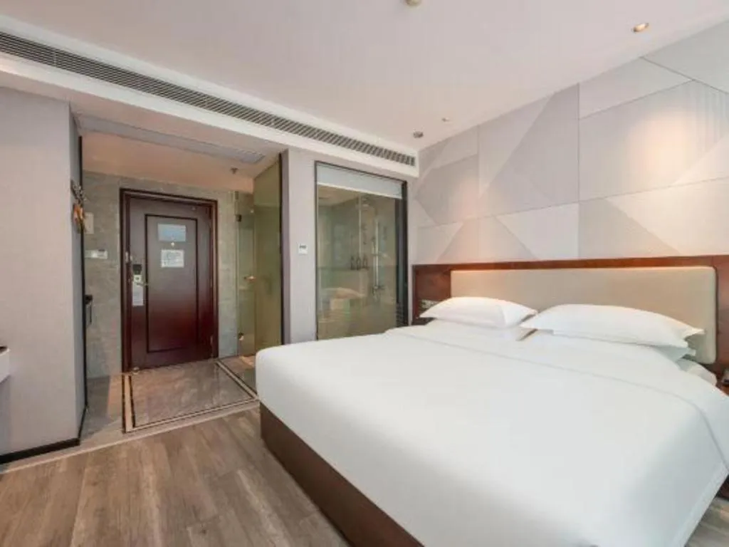 Bed in Borrman Hotel Yunfu Xinxing County Bus Station