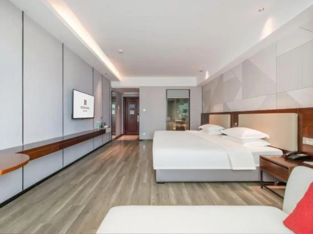 Bed in Borrman Hotel Yunfu Xinxing County Bus Station