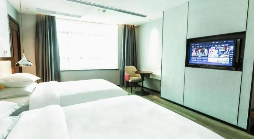 Bed in Borrman Hotel Yunfu Xinxing County Bus Station