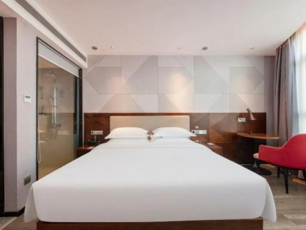 Bed in Borrman Hotel Yunfu Xinxing County Bus Station