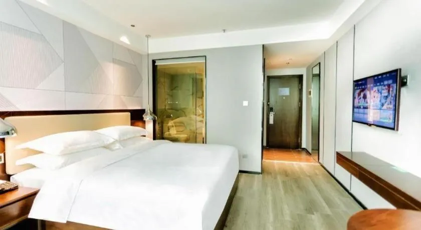 Bed in Borrman Hotel Yunfu Xinxing County Bus Station