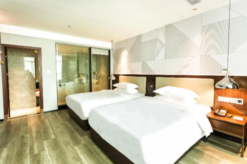 Bed in Borrman Hotel Yunfu Xinxing County Bus Station