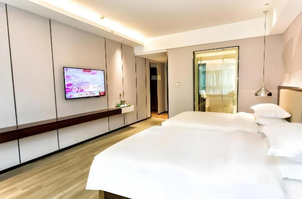 Bed in Borrman Hotel Yunfu Xinxing County Bus Station