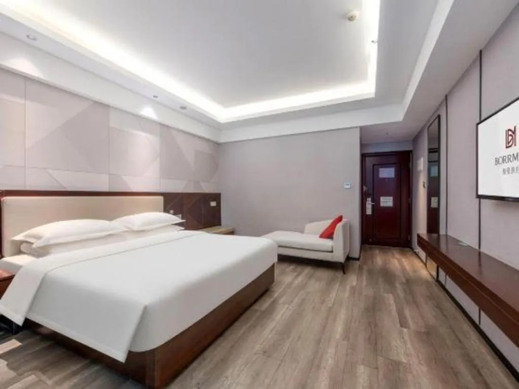 Bed in Borrman Hotel Yunfu Xinxing County Bus Station