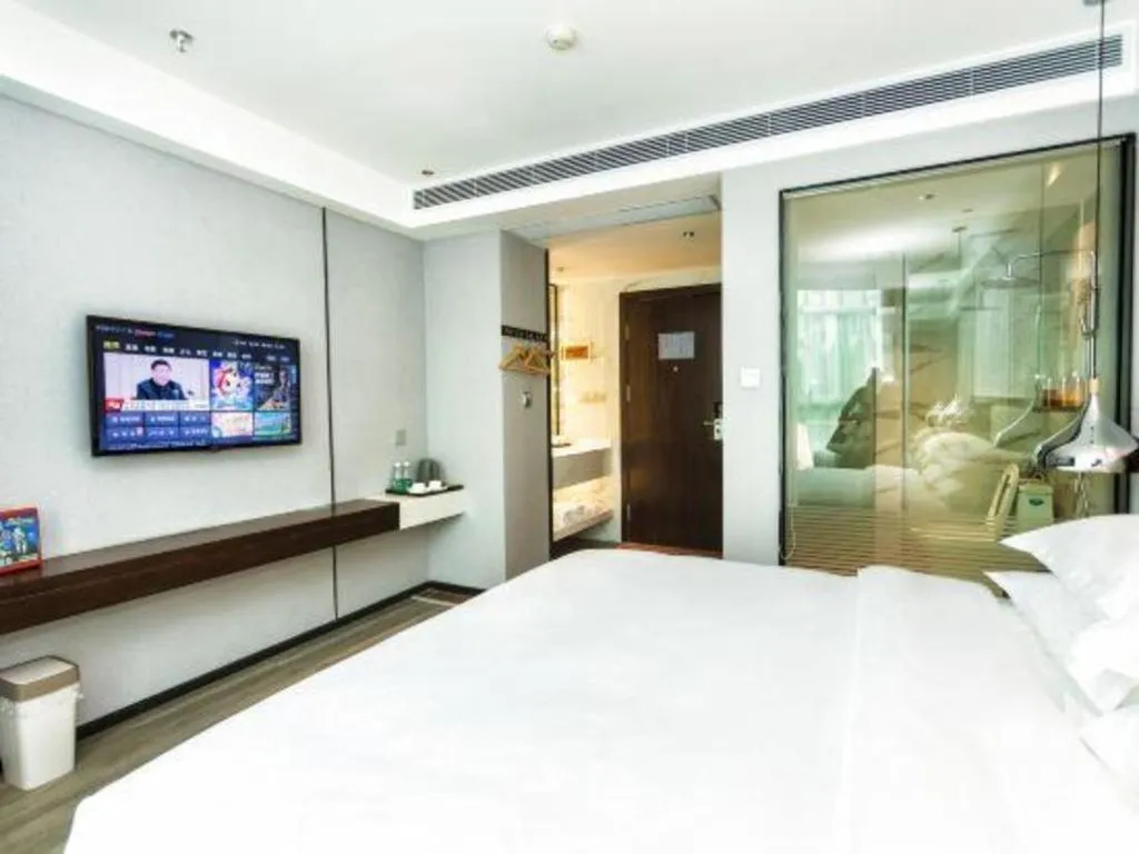 Bed in Borrman Hotel Yunfu Xinxing County Bus Station