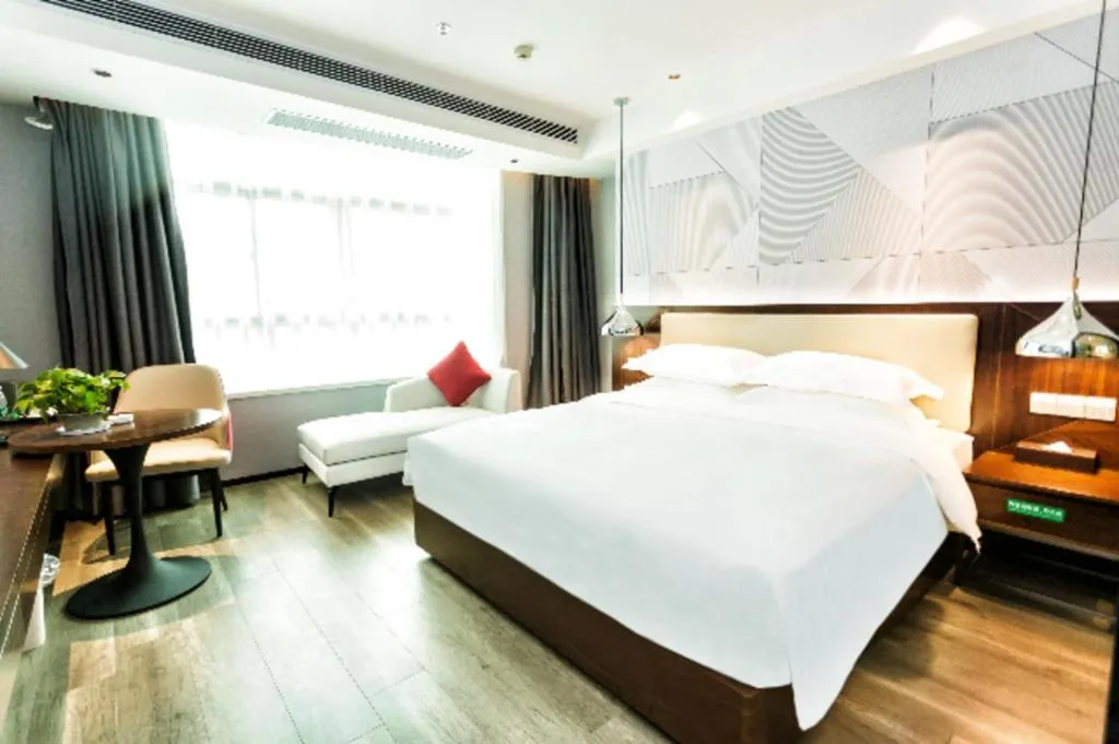 Bed in Borrman Hotel Yunfu Xinxing County Bus Station