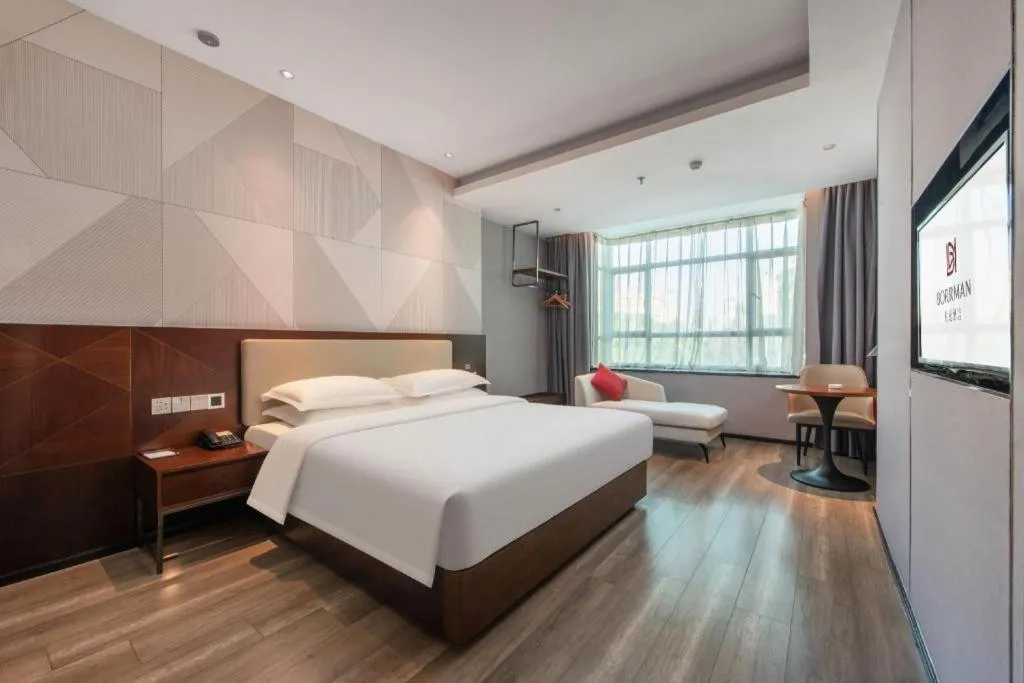 Bed in Borrman Hotel Yunfu Xinxing County Bus Station