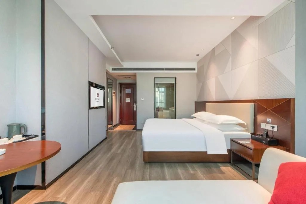 Bed in Borrman Hotel Yunfu Xinxing County Bus Station