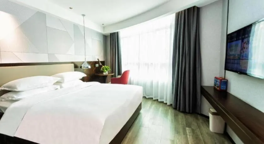 Bed in Borrman Hotel Yunfu Xinxing County Bus Station