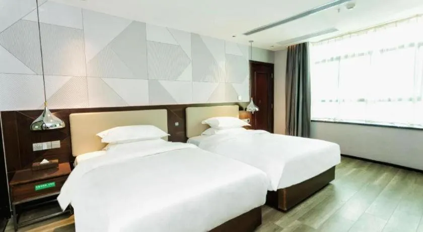 Bed in Borrman Hotel Yunfu Xinxing County Bus Station