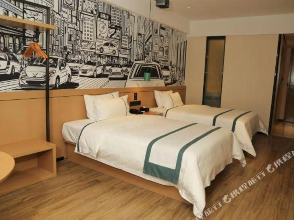 Bed in City Comfort Inn Maoming Binhai New Area Diancheng