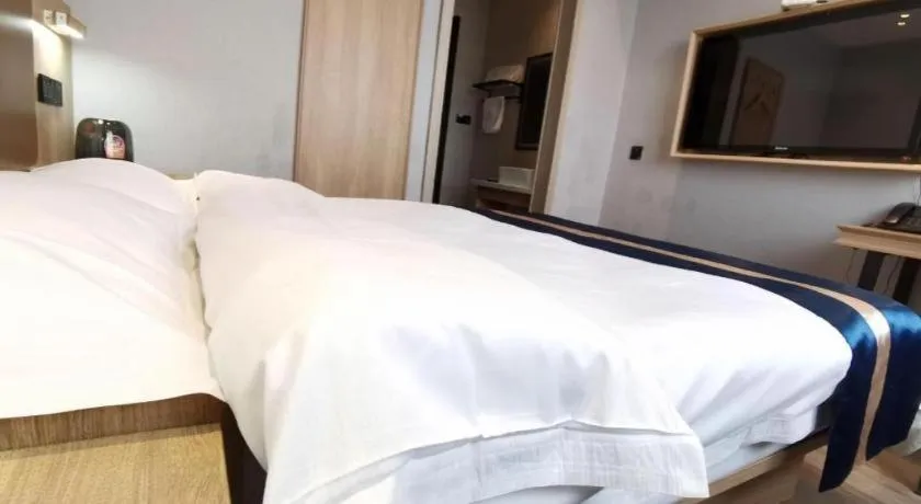 Bed in Green Tree Inn Express Huainan Xiejiaji District Orient Guangji Hospital