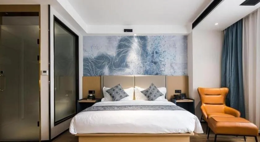 Bed in GEM Hotel Changzhou Xuejia'aoyuan North High-Speed Railway Station