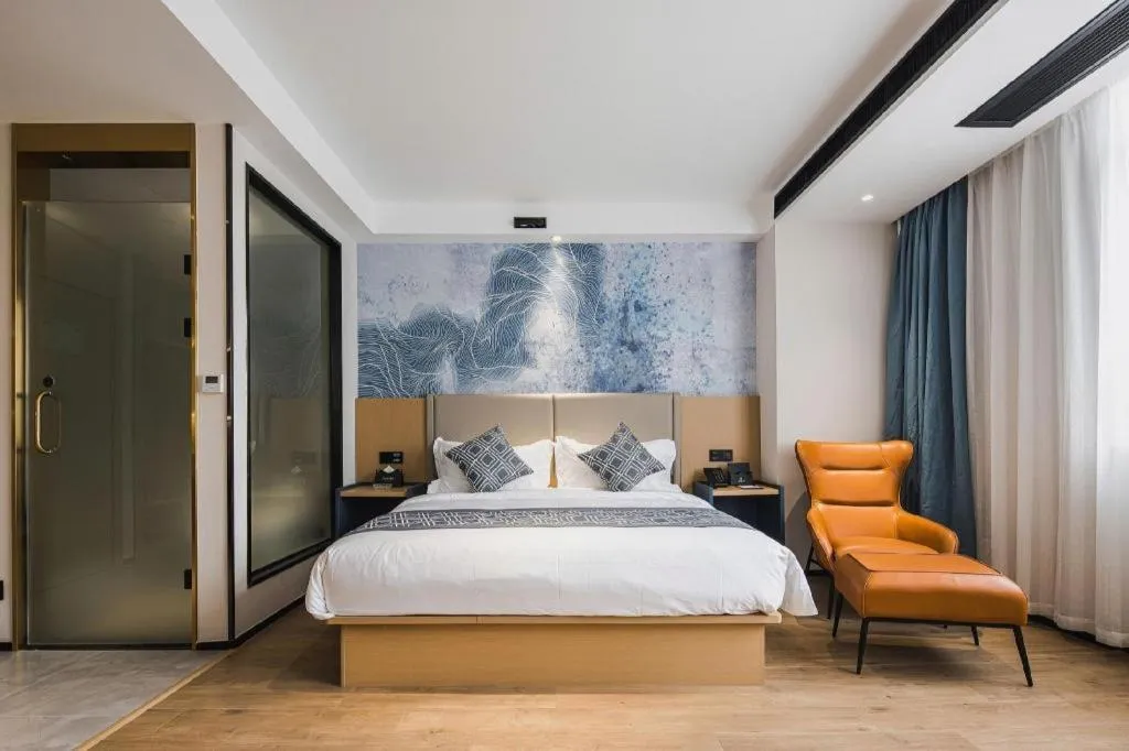 Bed in GEM Hotel Changzhou Xuejia'aoyuan North High-Speed Railway Station