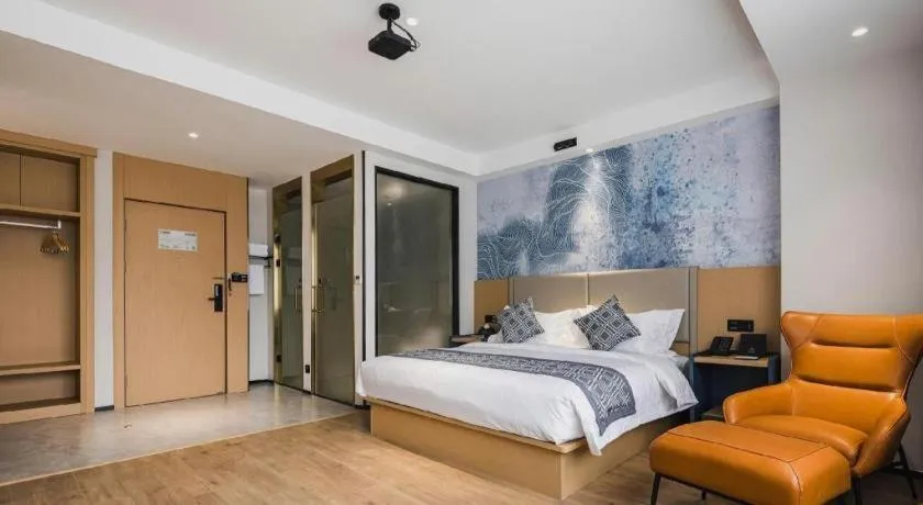 Bed in GEM Hotel Changzhou Xuejia'aoyuan North High-Speed Railway Station