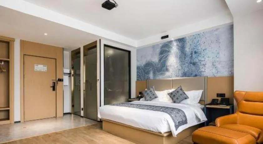 Bed in GEM Hotel Changzhou Xuejia'aoyuan North High-Speed Railway Station