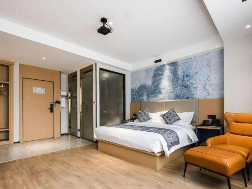 Bed in GEM Hotel Changzhou Xuejia'aoyuan North High-Speed Railway Station