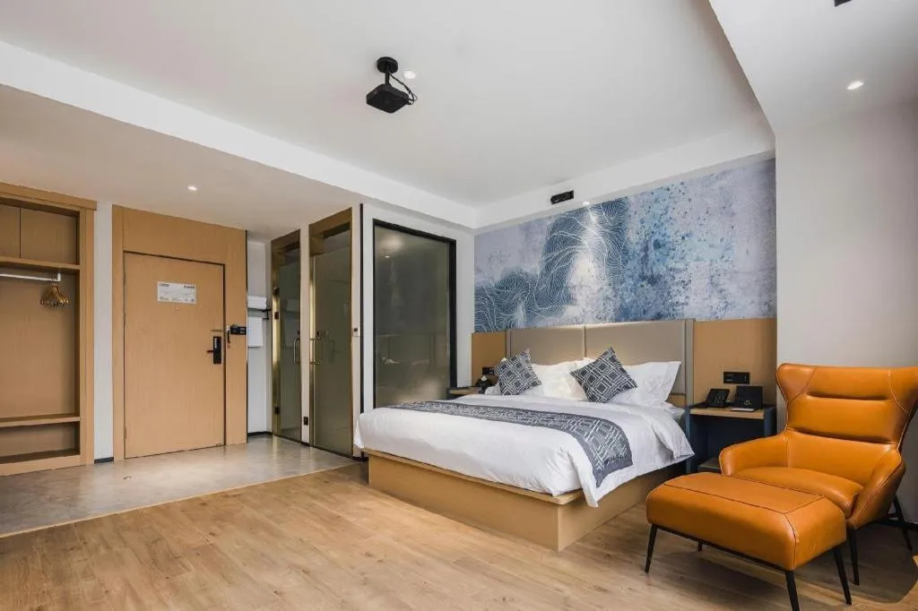 Bed in GEM Hotel Changzhou Xuejia'aoyuan North High-Speed Railway Station