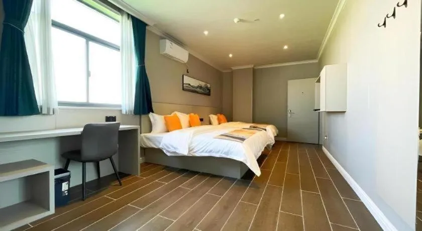 Bed in Shell Hotel Huai'an Zhuqiao Industrial Park