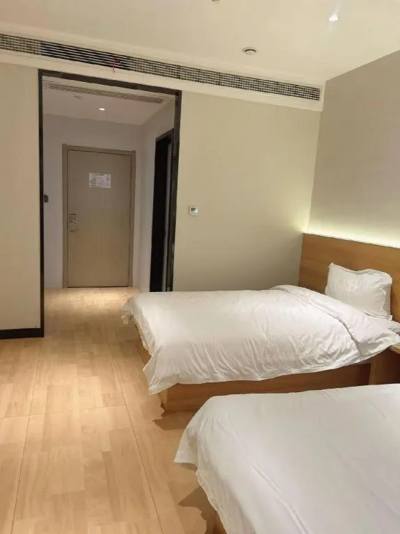 Bed in Shell Hotel Huai'an Zhuqiao Industrial Park