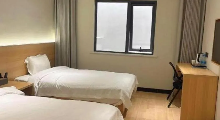Bed in Shell Hotel Huai'an Zhuqiao Industrial Park