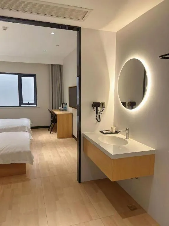 Bed in Shell Hotel Huai'an Zhuqiao Industrial Park