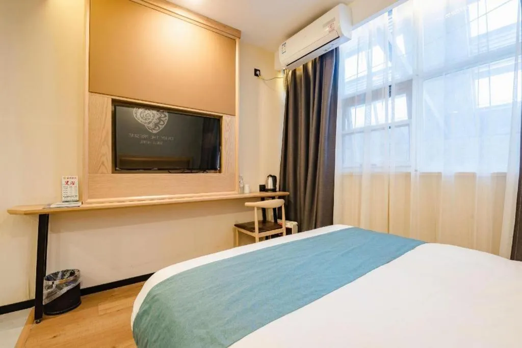 Bed in Shell Hotel Bozhou Lixin County Passenger Center