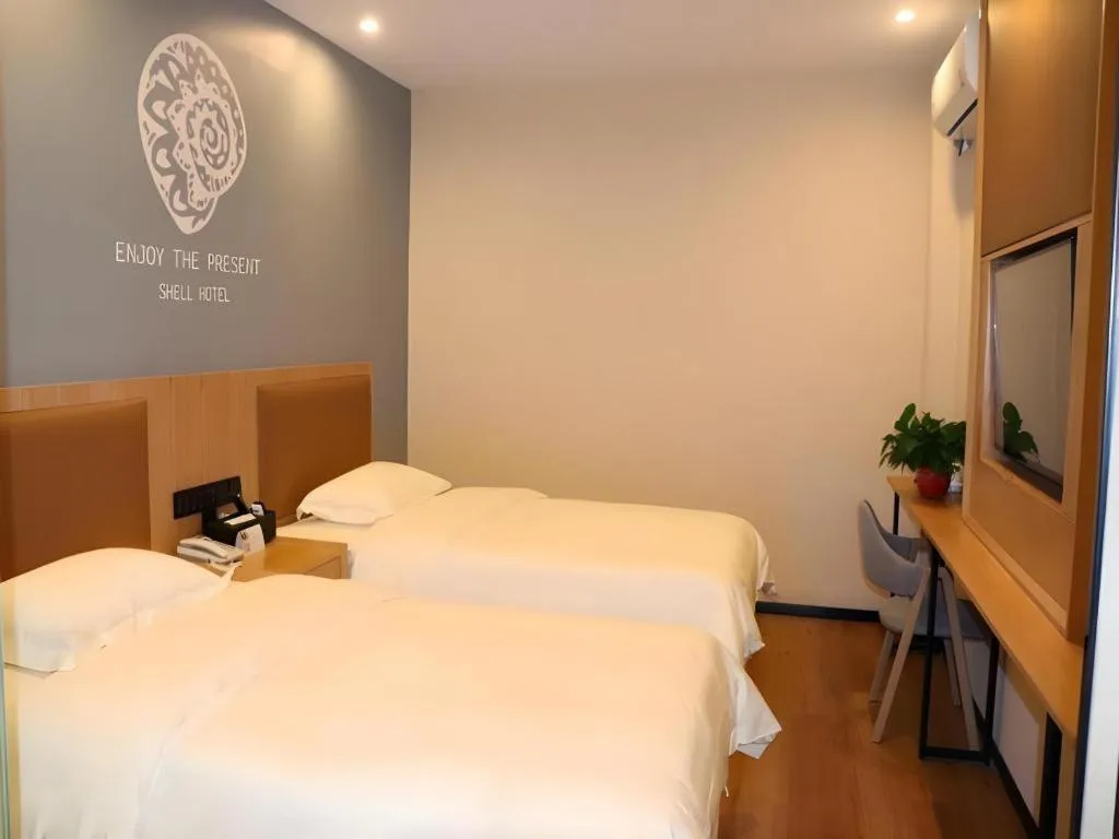 Bed in Shell Hotel Bozhou Lixin County Passenger Center