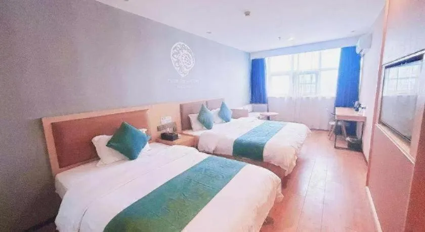 Bed in Shell Hotel Bozhou Lixin County Passenger Center