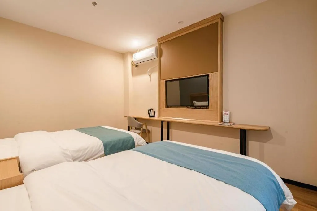 Bed in Shell Hotel Bozhou Lixin County Passenger Center