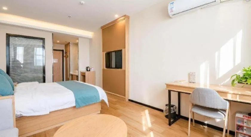 Bed in Shell Hotel Bozhou Lixin County Passenger Center