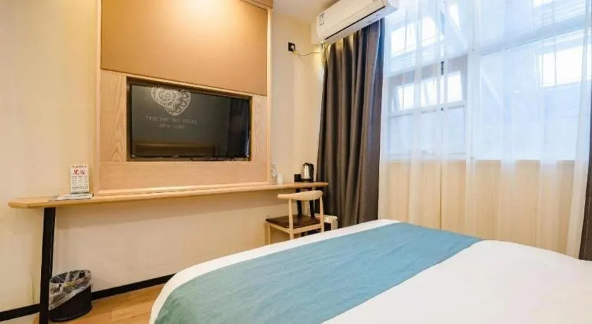 Bed in Shell Hotel Bozhou Lixin County Passenger Center