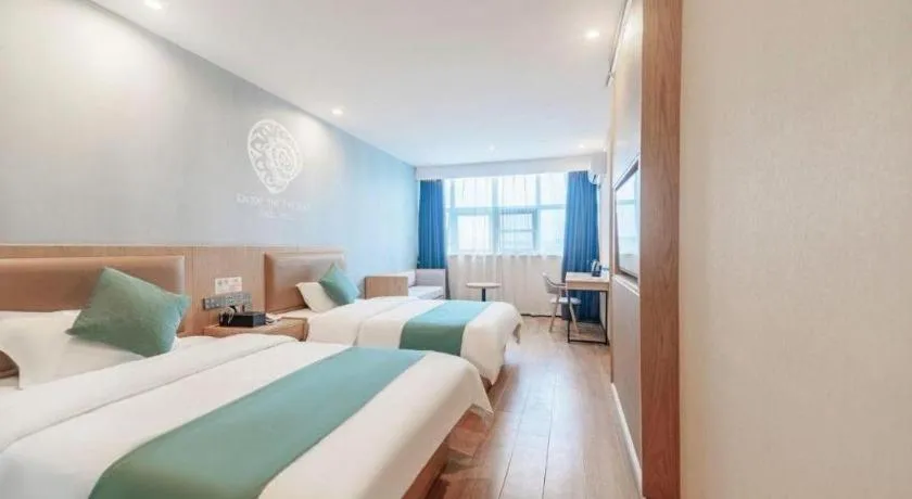 Bed in Shell Hotel Bozhou Lixin County Passenger Center