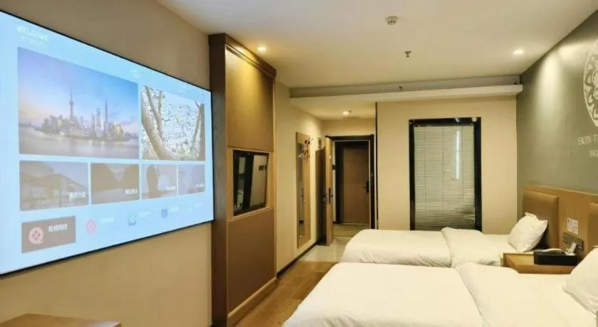 Bed in Shell Hotel Bozhou Lixin County Passenger Center