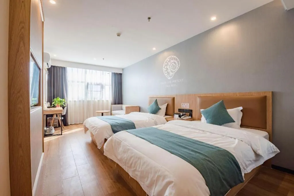 Bed in Shell Hotel Bozhou Lixin County Passenger Center