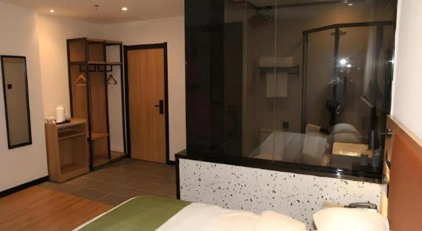 Bed in Green Tree Inn Express Inner Mongolia Ulan Qab High-Speed Railway Station