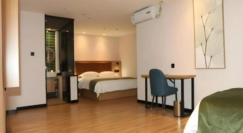 Bed in Green Tree Inn Express Inner Mongolia Ulan Qab High-Speed Railway Station