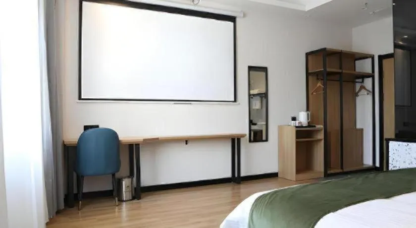 Bed in Green Tree Inn Express Inner Mongolia Ulan Qab High-Speed Railway Station