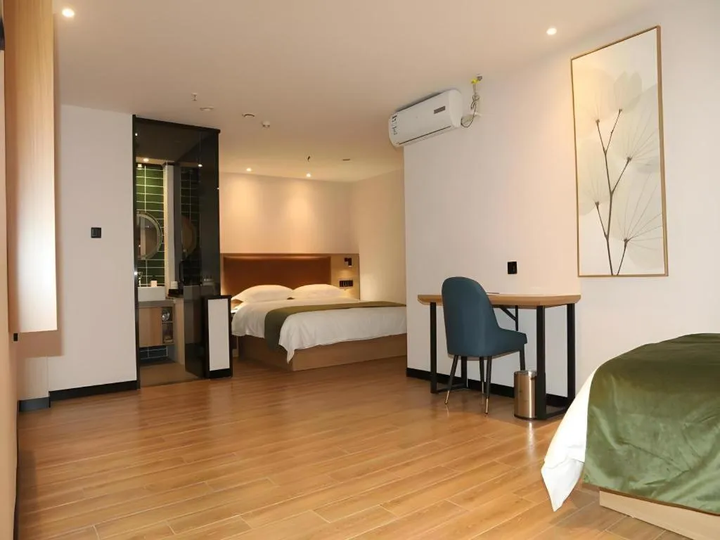 Bed in Green Tree Inn Express Inner Mongolia Ulan Qab High-Speed Railway Station