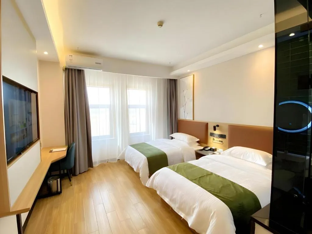 Bed in Green Tree Inn Express Inner Mongolia Ulan Qab High-Speed Railway Station